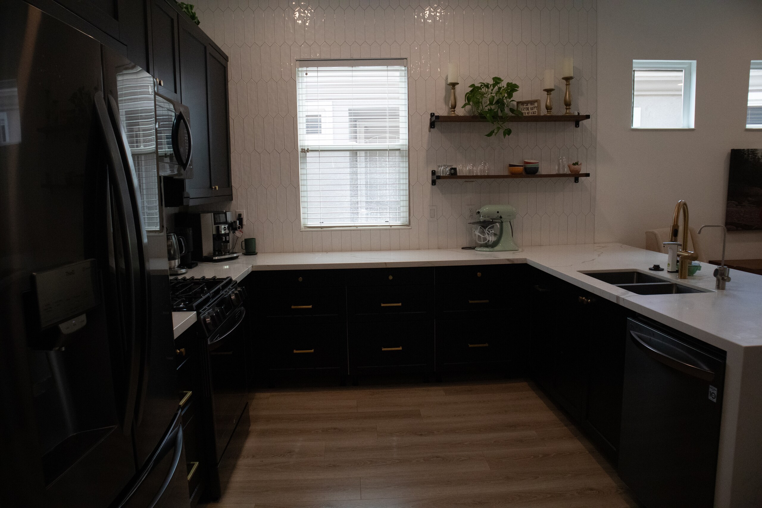 Kitchen window, quartz counters and deep drawer storage